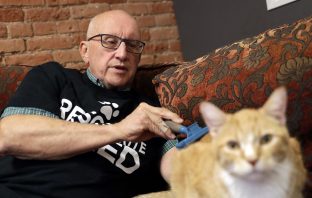 Animal Shelter Volunteer Naps With Cats
