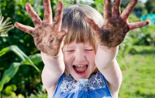 Germs Aren’t Always Evil—They Can Actually Help Your Kids Grow Healthier