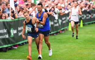 Selfless Runner Helps Collapsed Competitor Cross Finish Line