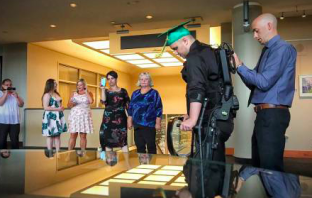 Paralyzed Teen Walks Across Graduation Stage to Receive High School Diploma