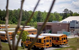 Why School Buses Have White Tops