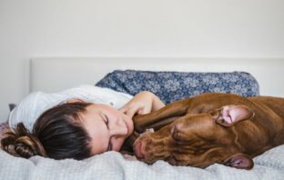 You Might Have A Tough Night Sleeping With Your Pet